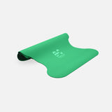 Tapis de sol pour le yoga de la marque hercule studio modèle mar couleur golf green packshot semi roulé