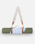 Hercule Studio Axel khaki and blue printed nomad bundle including the graphic Archy mat and a mat carrying strap for sport mats, design and functional duo for Pilates and fitness on the move, packshot