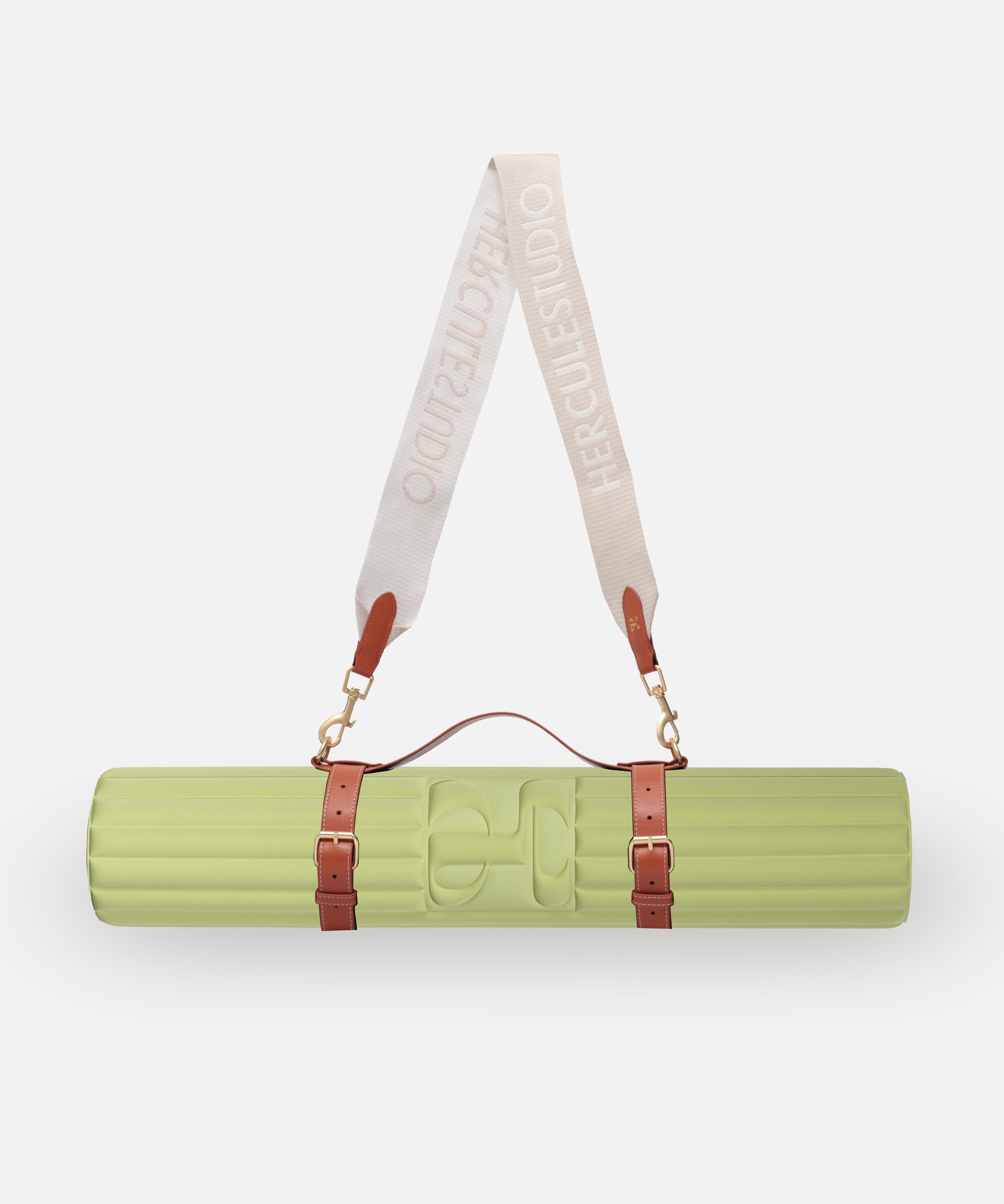 Bundle nomade Hercule Studio vert pistache comprenant tapis Archy ergonomique et sangle de transport pour tapis de sport, ensemble léger et fonctionnel pour Pilates et fitness, fabrication française, visuel packshot