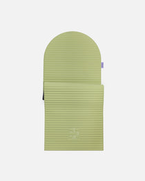 Hercule Studio Archy pistachio green arch-shaped sport mat, durable Made in France design mat for fitness, Pilates and stretching, half unrolled view