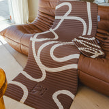 Tapis de sol pour le fitness le yoga et le pilates de la marque hercule studio modèle archy et pad de confort galé couleur imprimé bari choco packshot salon