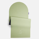 Tapis de sol pour fitness yoga et pilates de la marque hercule studio modèle archy couleur pistache packshot semi déplié