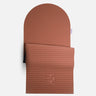Tapis de sol pour le fitness le yoga et le pilates de la marque hercule studio modèle archy couleur terre cuite packshot semi déplié