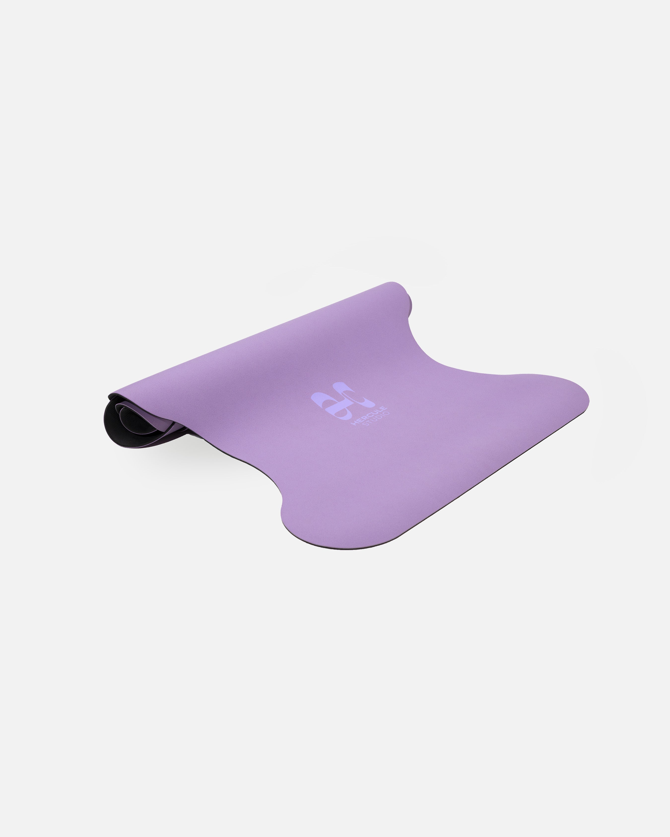 Half-rolled packshot of the Hercule Studio Lavender purple yoga mat, durable and made in France, optimal grip for asanas