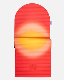 Hercule Studio x Univers Uchronia arch-shaped sport mat, Archy Summer red and yellow printed model, durable Made in France design mat for fitness, Pilates and stretching, half unrolled view