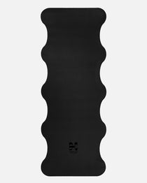 Hercule Studio Midnight Black yoga mat unrolled, natural rubber PVC-free, strong grip for vinyasa and hatha sessions