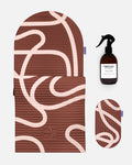 Hercule Studio Bari Choco printed essential bundle with the brown graphic Archy mat, the Galé 3-in-1 comfort pad and the sport mat sanitizing spray, durable made in France Pilates and fitness bundle, packshot